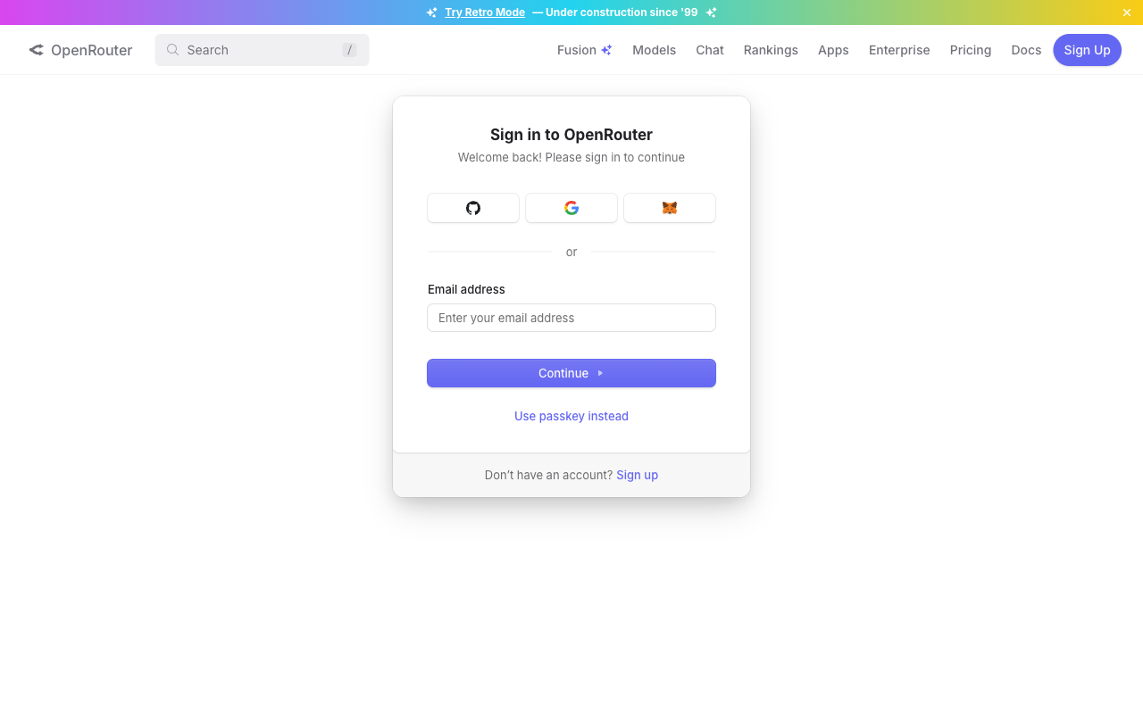 OpenRouter のサインイン画面。Sign in to OpenRouter と表示され、GitHub、Google、MetaMask のサインインボタンとメールアドレス欄が見えている画面